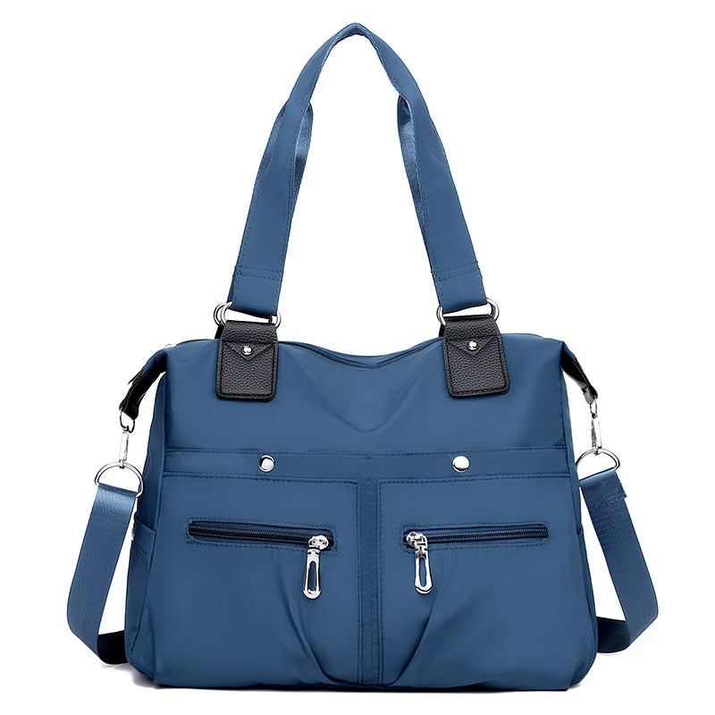 AMELIA | BORSA OXFORD CON MANICI E TRACOLLA